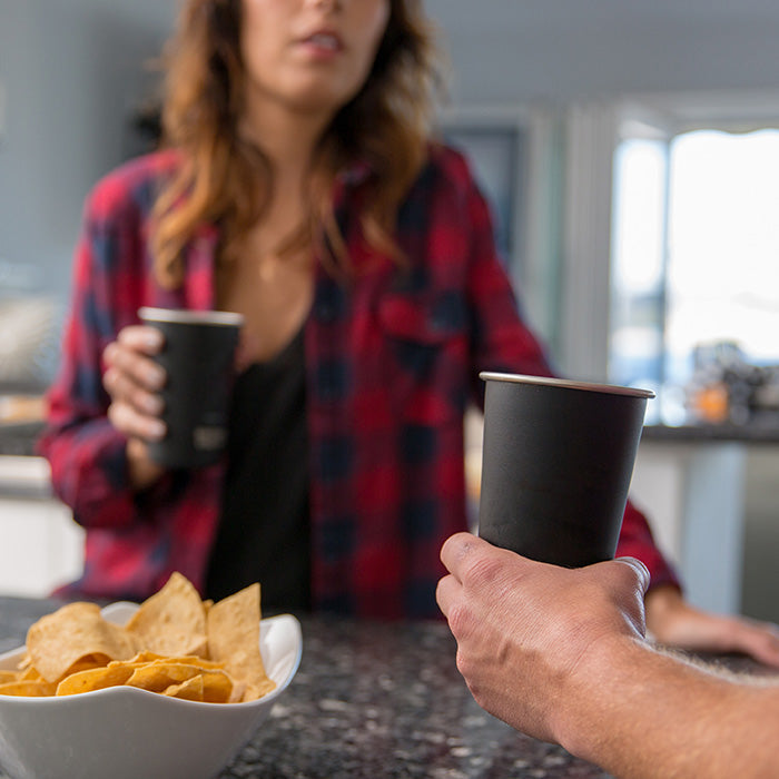 16oz-pint-cup-q3 16ounce_steel_pint_cup_black_party_lifestyle_e7c4b89f-bee2-44df-bb63-bc286febb421.jpg