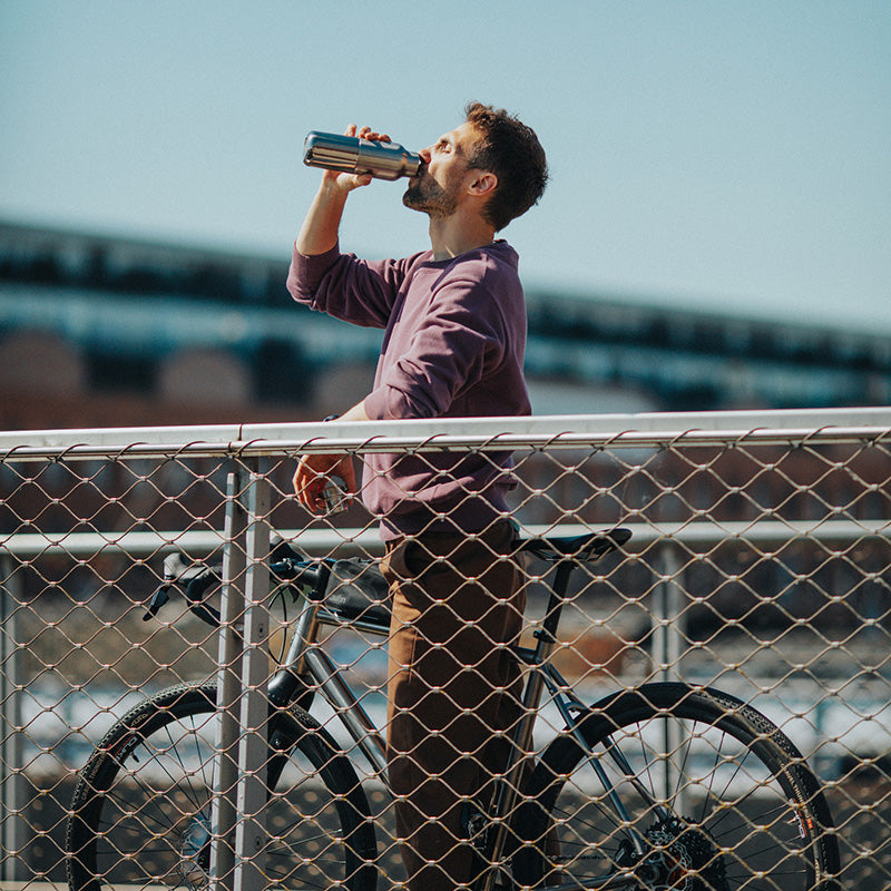 12oz-rise-reflect-with-bamboo-cap-f7 16oz_rise_reflect_man_bike_square.jpg