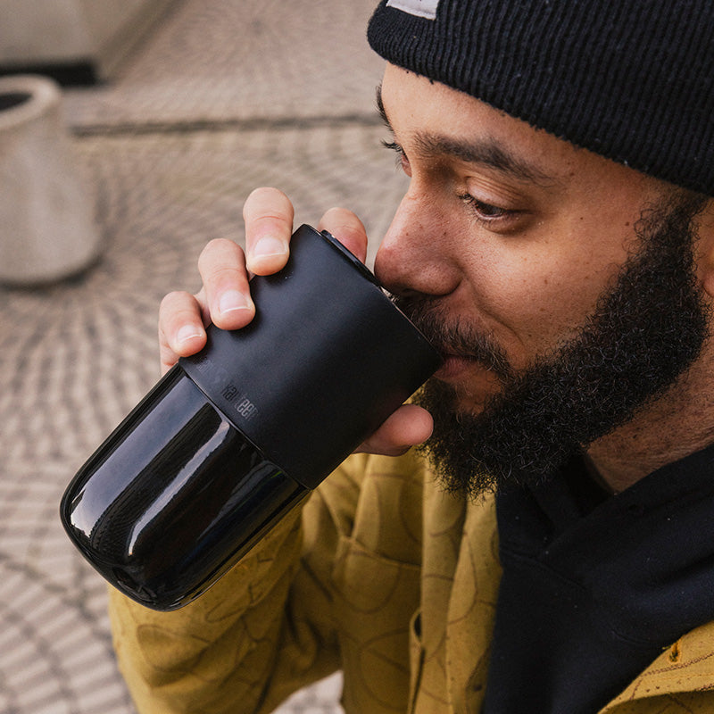 16oz-rise-tumbler-h4 16oz_rise_tumbler_black_man_drink_square.jpg