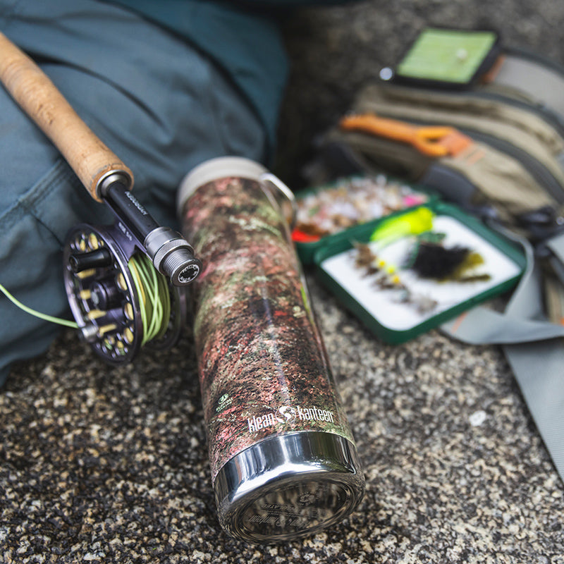 20oz-tkwide-with-cafe-cap-mossy-oak-e4 20oz_tumbler_mossyoak_rainbowtrout_flyfish_top_square.jpg