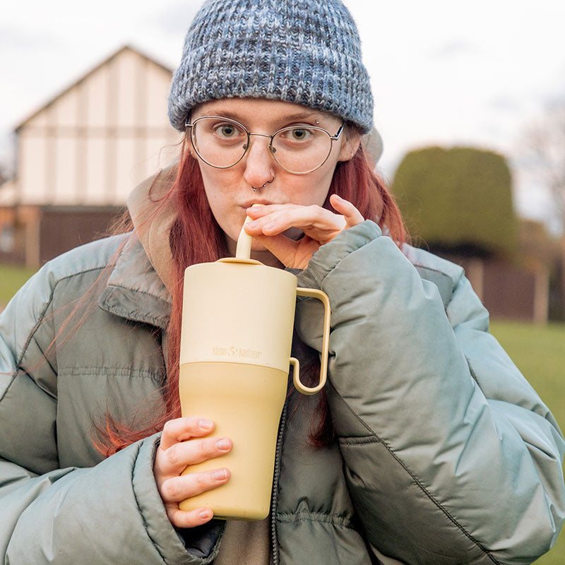 26oz-rise-tumbler-with-straw-lid-i8 26oz_rise_rumbler_straw_wax_yellow_woman_sip_square.jpg