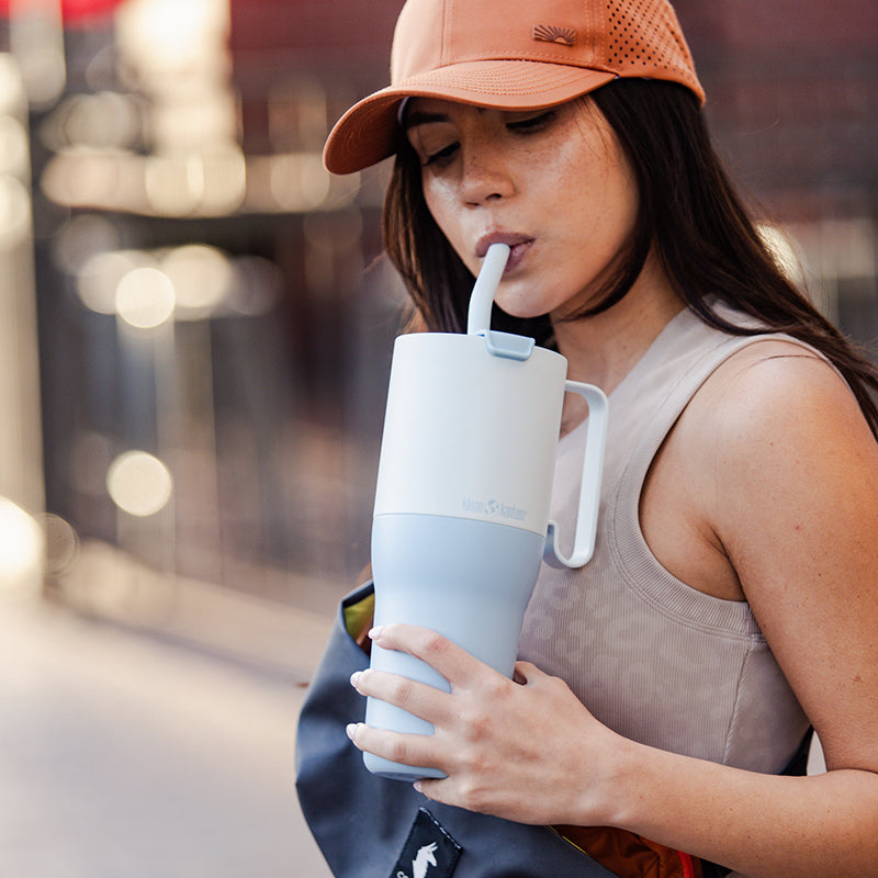 36oz-rise-tumbler-with-straw-lid-t9 36oz_rise_tumbler_straw_girl_sip_square.jpg