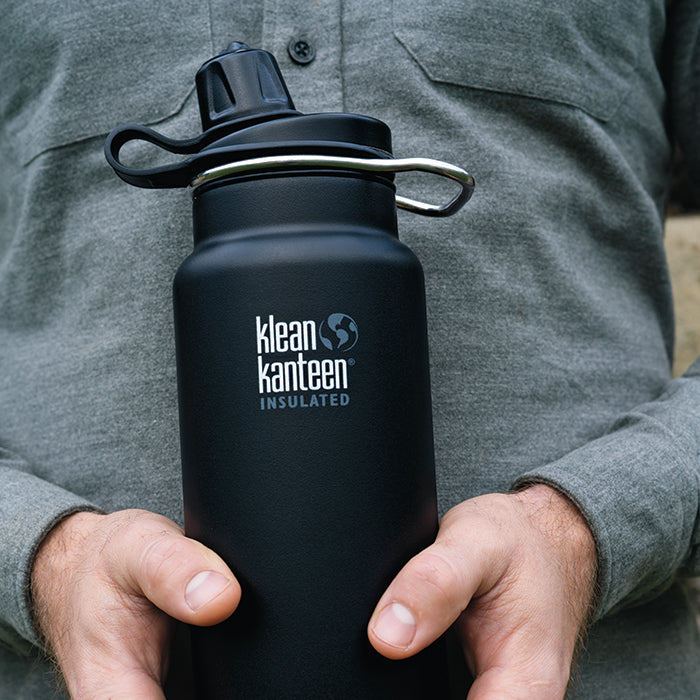 tkwide-chug-cap-w7 K32TKWSSL-SB-Craddled-Bottle_closeup_lifestyle.jpg