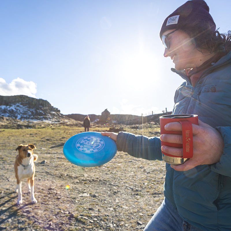 12oz-camp-mug-d1 insulated_camp_mug_12oz_woman_dog_frisbee_square.jpg